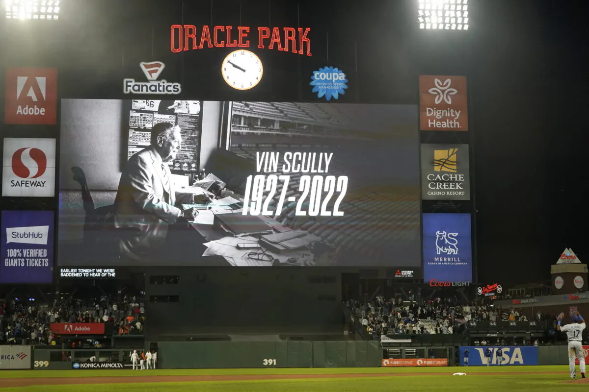 The scoreboard at Oracle Park shows a message for broadcaster Vin Scully after the Los Angeles Dodgers defeated the San Francisco Giants in a baseball game in San Francisco, Tuesday, Aug. 2, 2022. (Jeff Chiu/AP Photo)