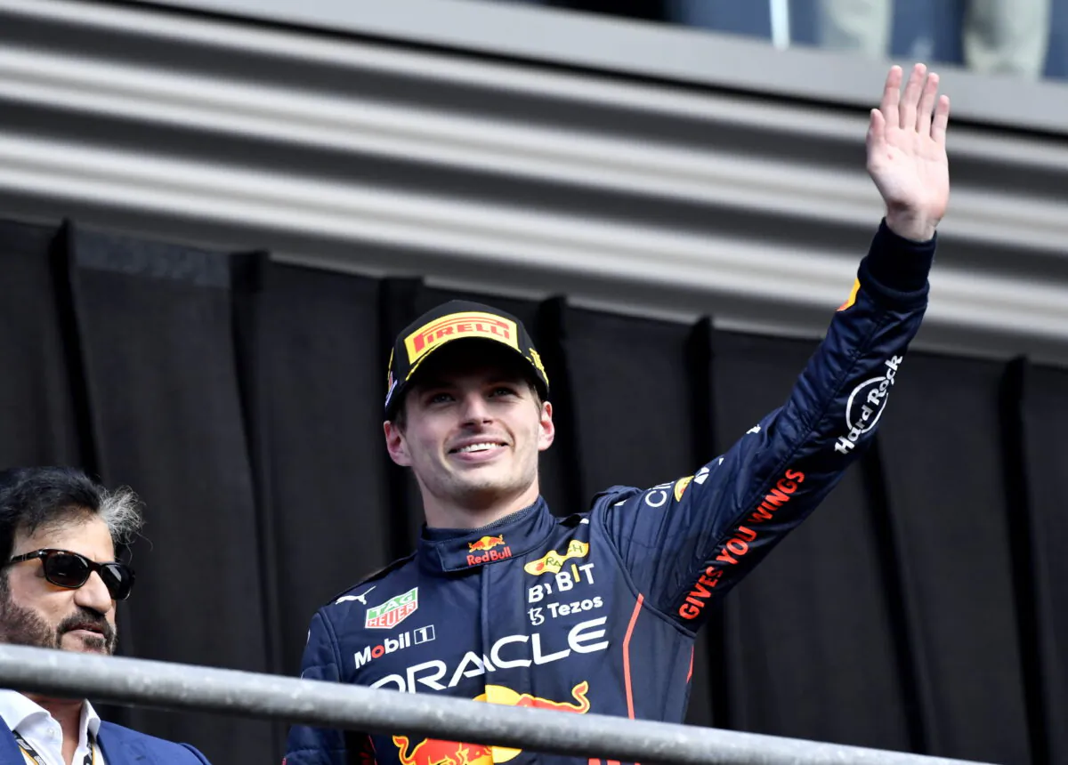 First place Red Bull driver Max Verstappen of the Netherlands waves to the crowd as he steps on to the podium during the Formula One Grand Prix at the Spa-Francorchamps racetrack in Spa, Belgium, on Aug. 28, 2022. (Geert Vanden Wijngaert/AP Photo)