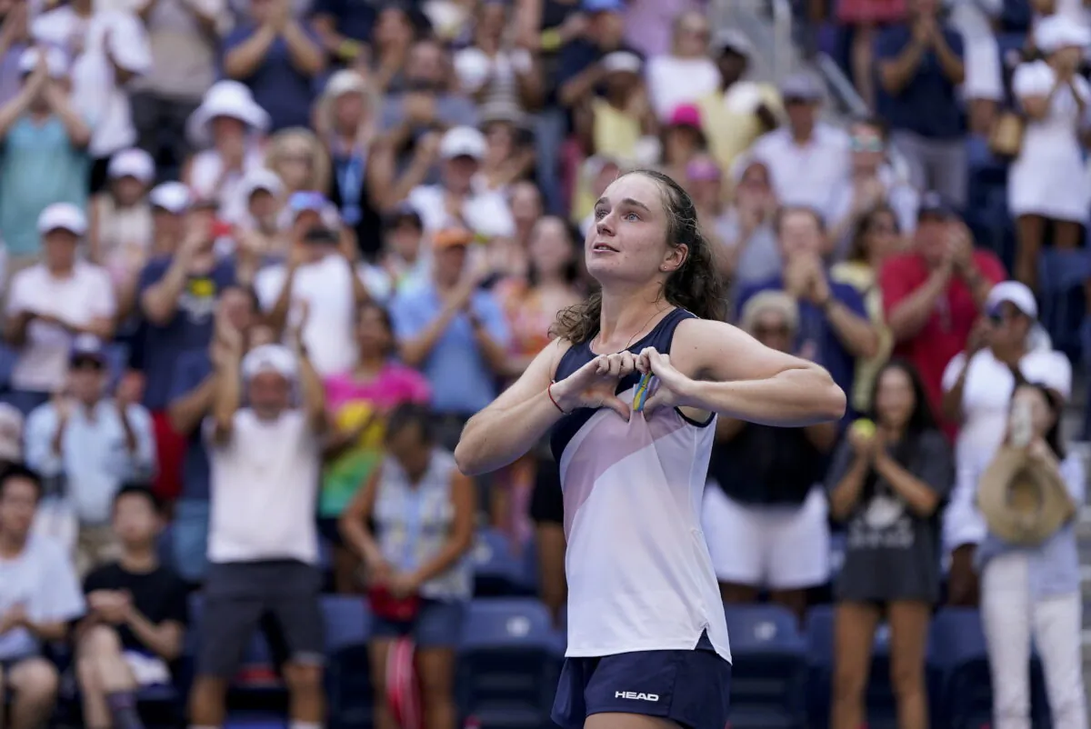 Daria Snigur, of Ukraine, reacts after upsetting Simona Halep, of Romania, during the first round of the US Open tennis championships, in New York, Aug. 29, 2022. (Seth Wenig/AP Photo)