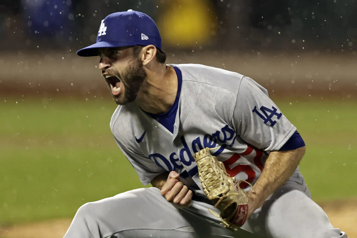 Los Angeles Dodgers pitcher Jake Reed reacts after the final out of the team's baseball game against the New York Mets in New York, Aug. 30, 2022. (Adam Hunger/AP Photo)