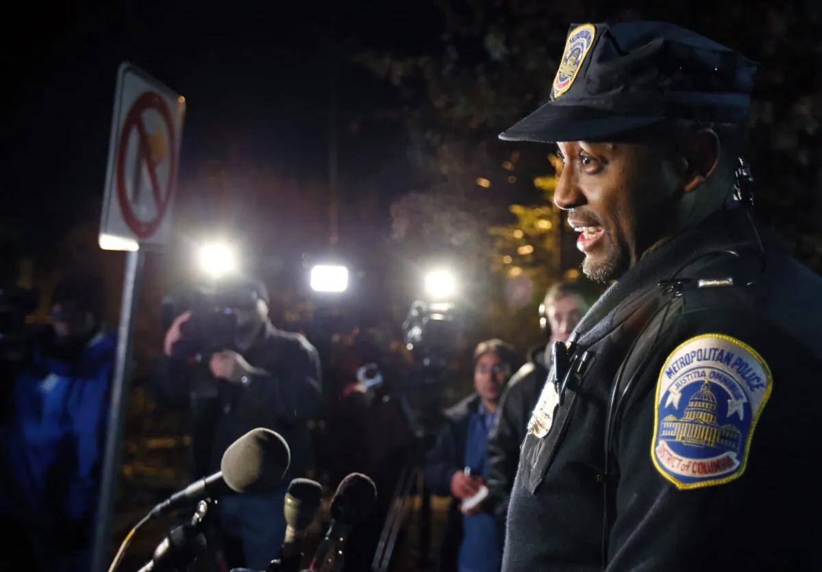 Washington Metro Police Lt. Jesse Porter speaks to the media in Wash., on Dec. 11, 2013. (Alex Brandon/AP Photo)