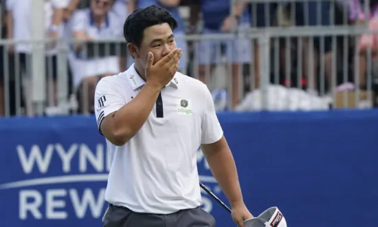 Kim Arrives on PGA Tour With 61 to Win Wyndham Championship