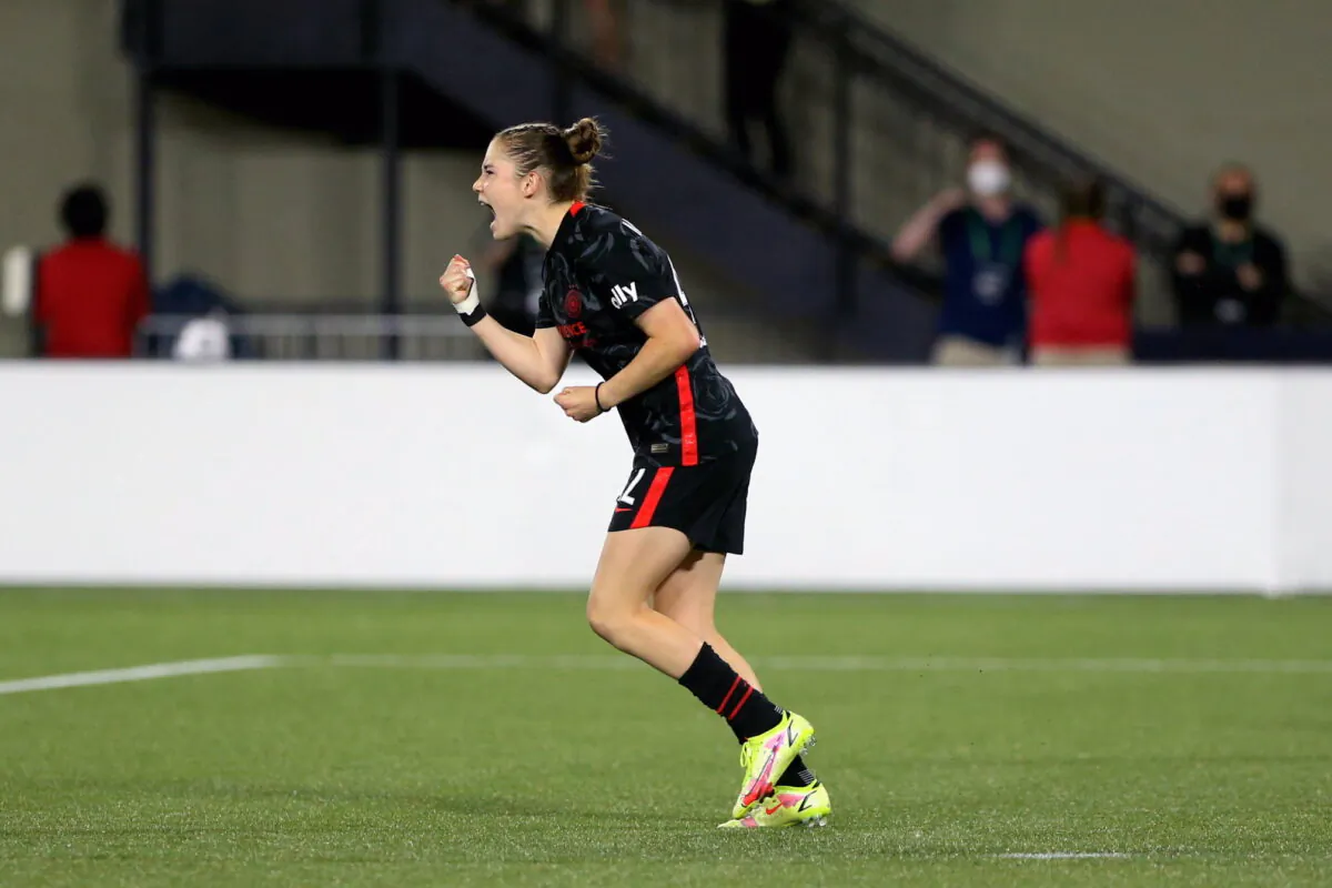 Portland Thorns midfielder Olivia Moultrie celebrates after scoring a penalty kick against the Houston Dash in a semifinals matchup of the Women's International Champions Cup at Providence Park in Portland, Ore., Wednesday, Aug. 18, 2021. (Sean Meagher/AP Photo)