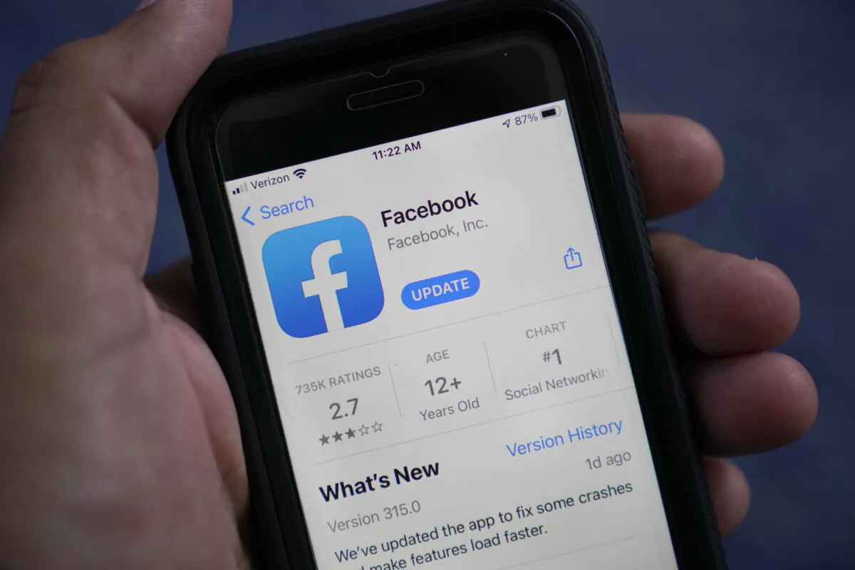 The Facebook app on a smart phone in Surfside, Fla., on April 23, 2021. (Wilfredo Lee/AP Photo)