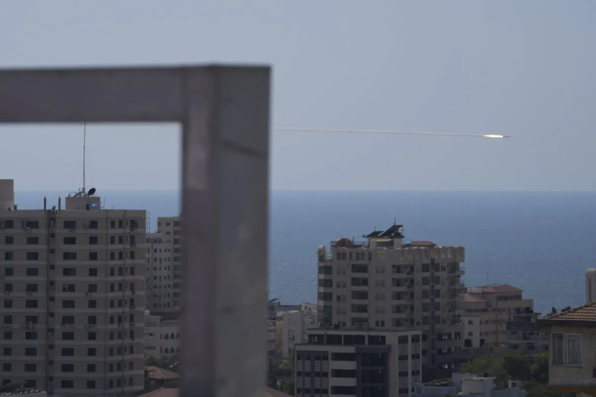 A rocket is launched from the Gaza Strip towards Israel, in Gaza City, on Aug. 7, 2022. (Hatem Moussa/AP Photo)
