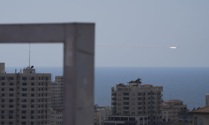 A rocket is launched from the Gaza Strip towards Israel, in Gaza City, on Aug. 7, 2022. (Hatem Moussa/AP Photo)
