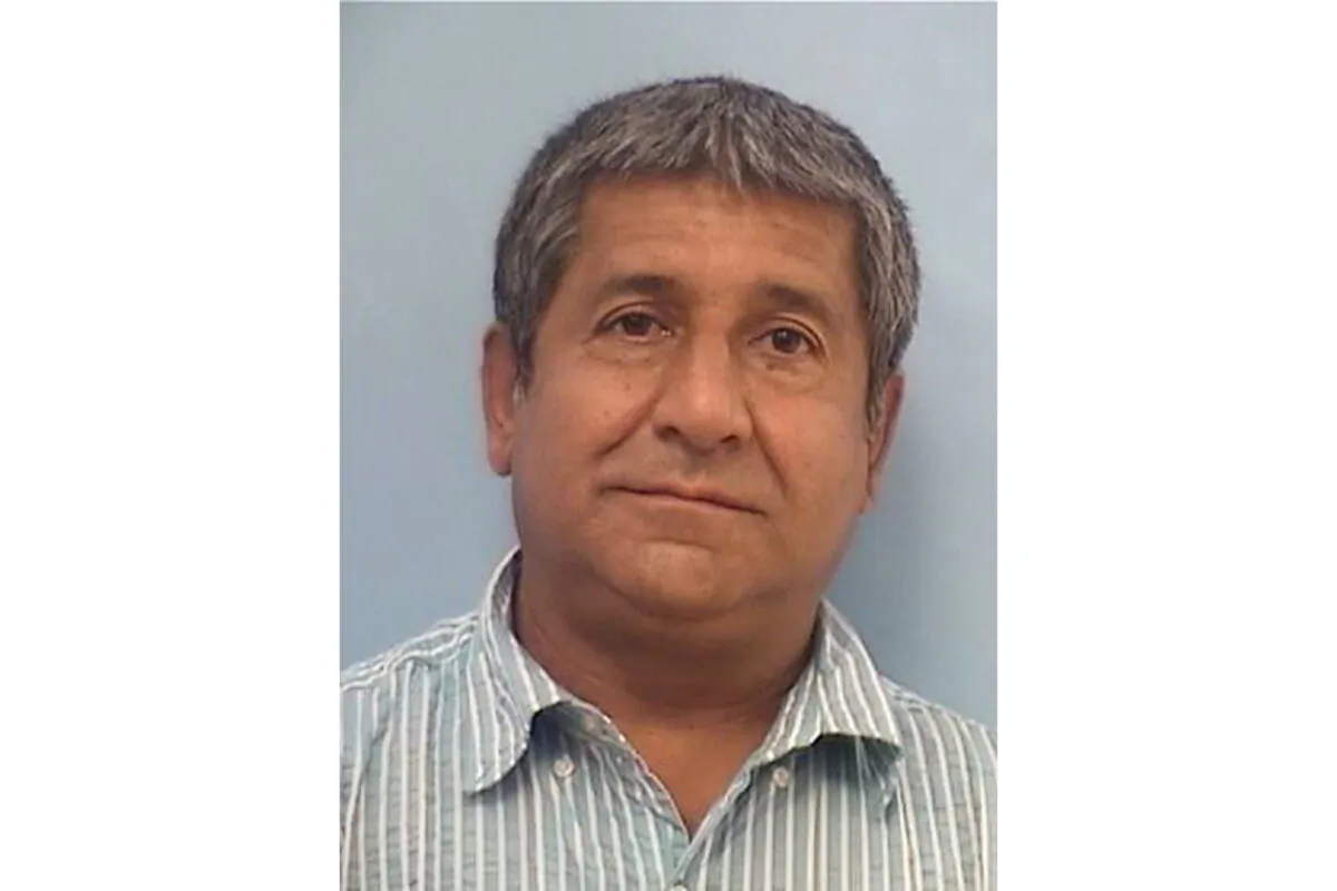 This photo released Aug. 9, 2022, by the Albuquerque Police Department shows Muhammad Syed, 51, who was taken into custody Aug. 8, 2022, in connection with the killings of four Muslim men in Albuquerque, New Mexico, over the last nine months. He faces charges in two of the deaths and is the primary suspect in the other two murders. (Albuquerque Police Department via AP)