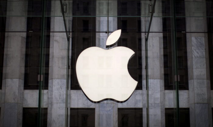 An Apple logo hangs above the entrance to the Apple store on Fifth Avenue in New York City, on July 21, 2015. (REUTERS/Mike Segar)