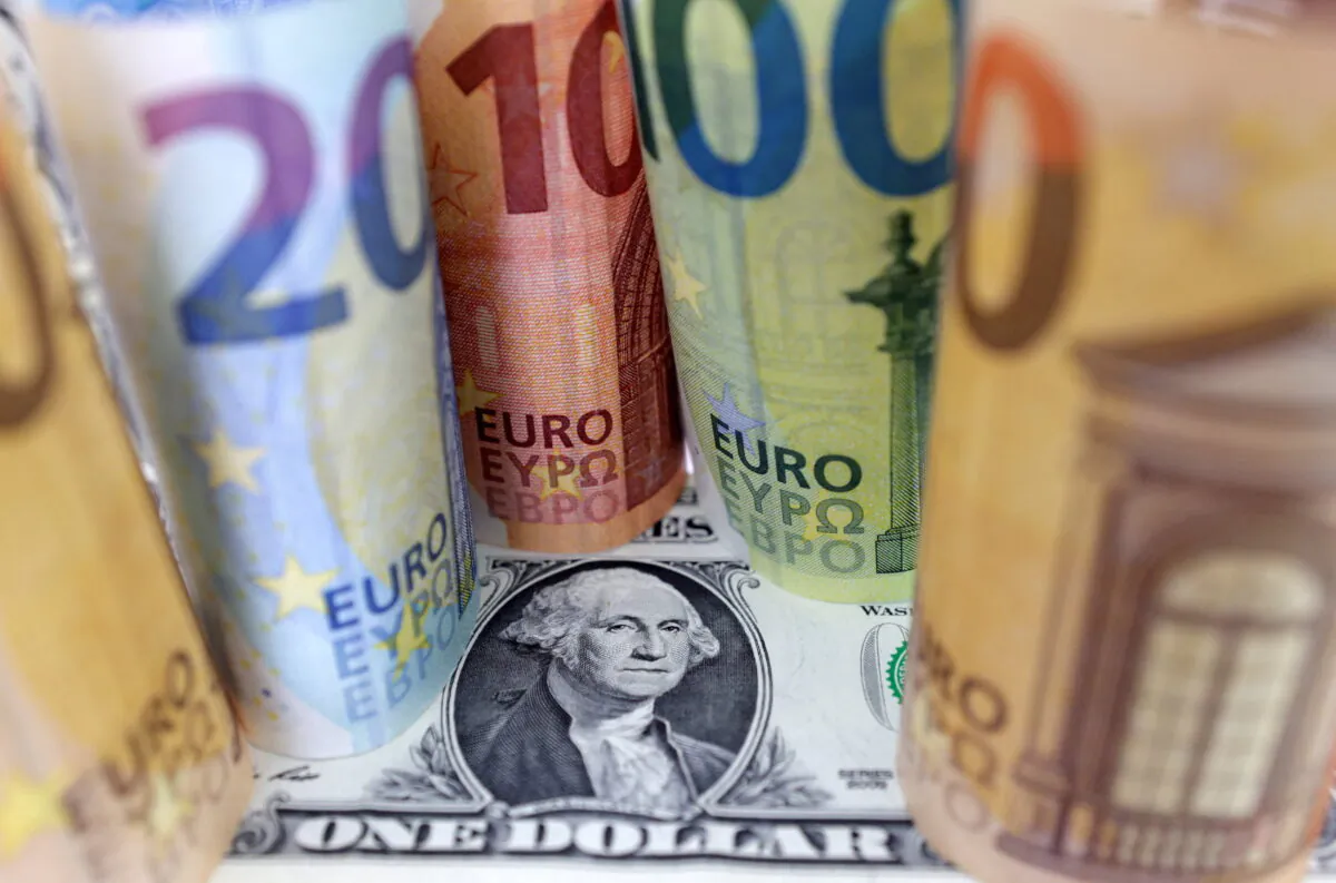 U.S. Dollar and Euro banknotes are seen in this illustration taken on July 17, 2022. (Dado Ruvic/Reuters)