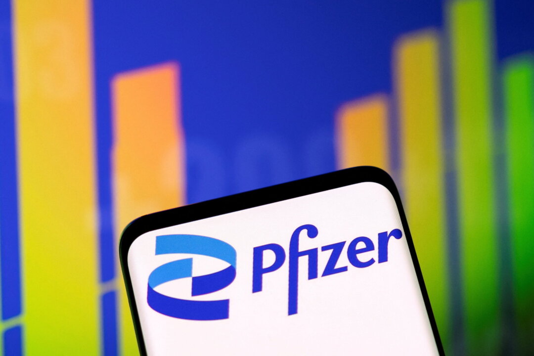 Pfizer logo and stock graph are seen in this illustration taken on May 1, 2022. (Dado Ruvic/Illustration/Reuters)