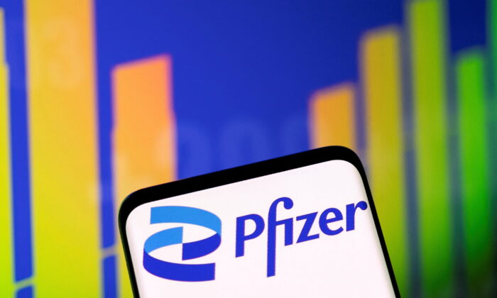 Pfizer logo and stock graph are seen in this illustration taken on May 1, 2022. (Dado Ruvic/Illustration/Reuters)