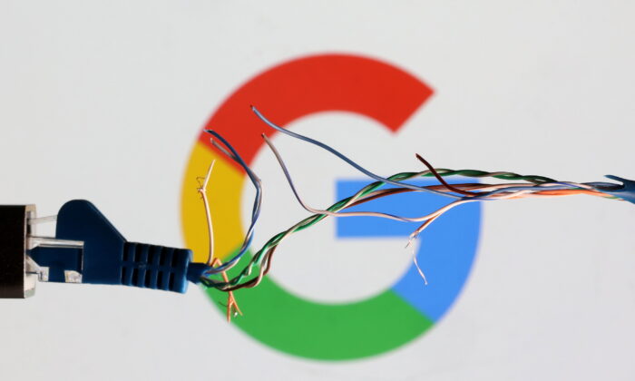 Broken Ethernet cable in front of Google logo in this illustration taken on March 11, 2022. (Dado Ruvic/Illustration/Reuters)