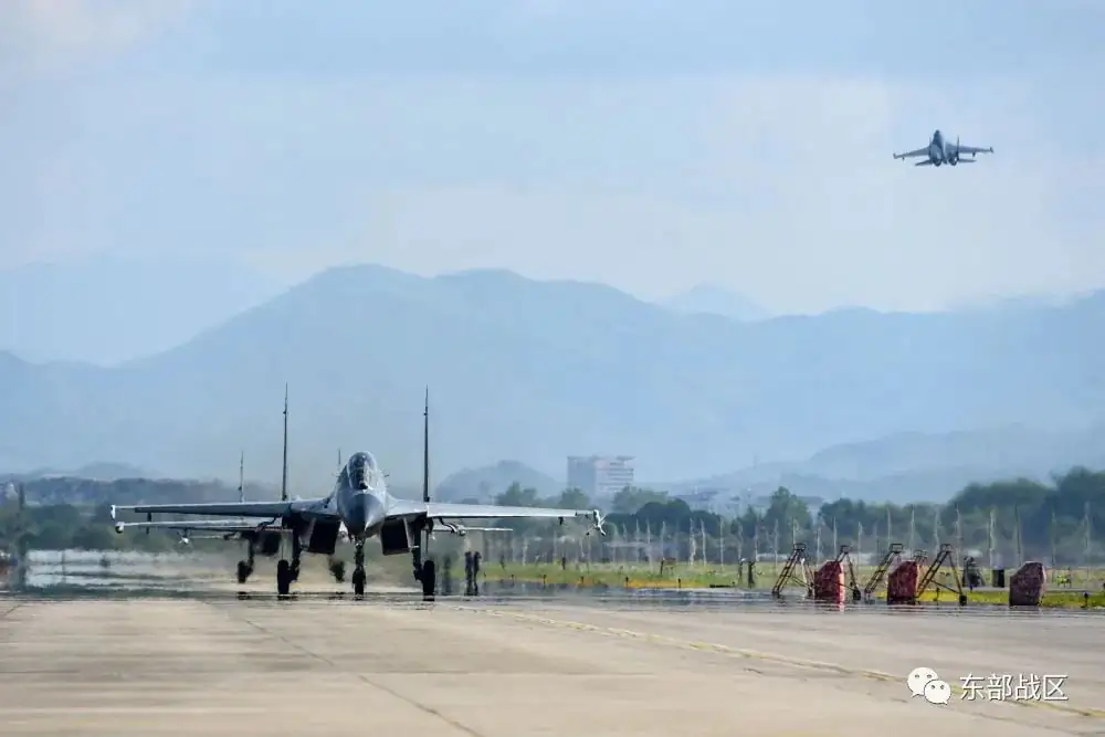 An Air Force aircraft under the Eastern Theatre Command of China's People's Liberation Army (PLA) takes off for military exercises in the waters around Taiwan from an undisclosed location in this Aug. 4, 2022, handout released on Aug. 5, 2022. (Eastern Theatre Command/Reuters)