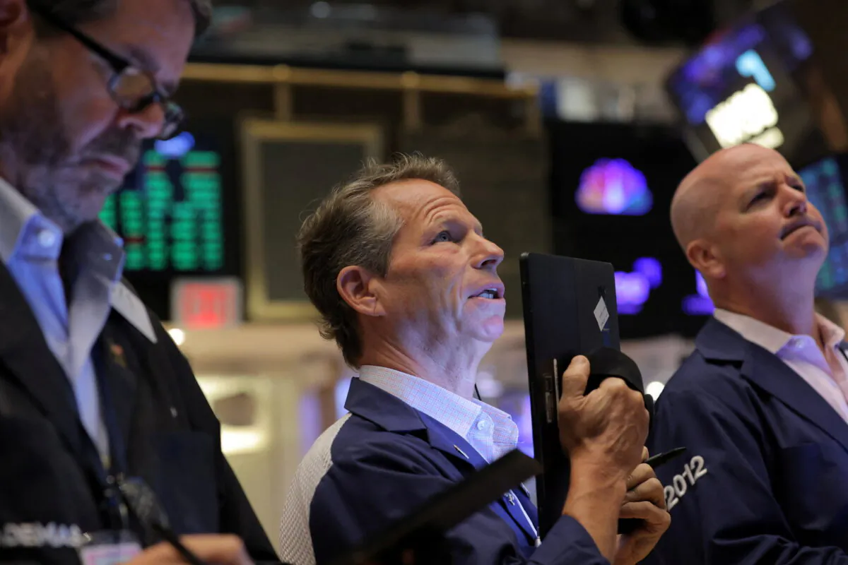 Traders work on the trading floor at the New York Stock Exchange (NYSE) in Manhattan, New York City on Aug. 8, 2022. (Andrew Kelly/Reuters)