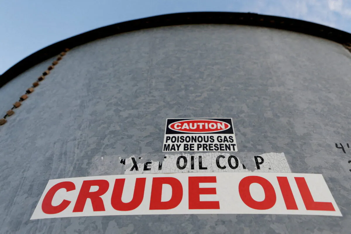Sticker reads 'crude oil' on the side of a storage tank in the Permian Basin in Mentone, Loving County, Texas, on Nov. 22, 2019. Reuters/Angus Mordant