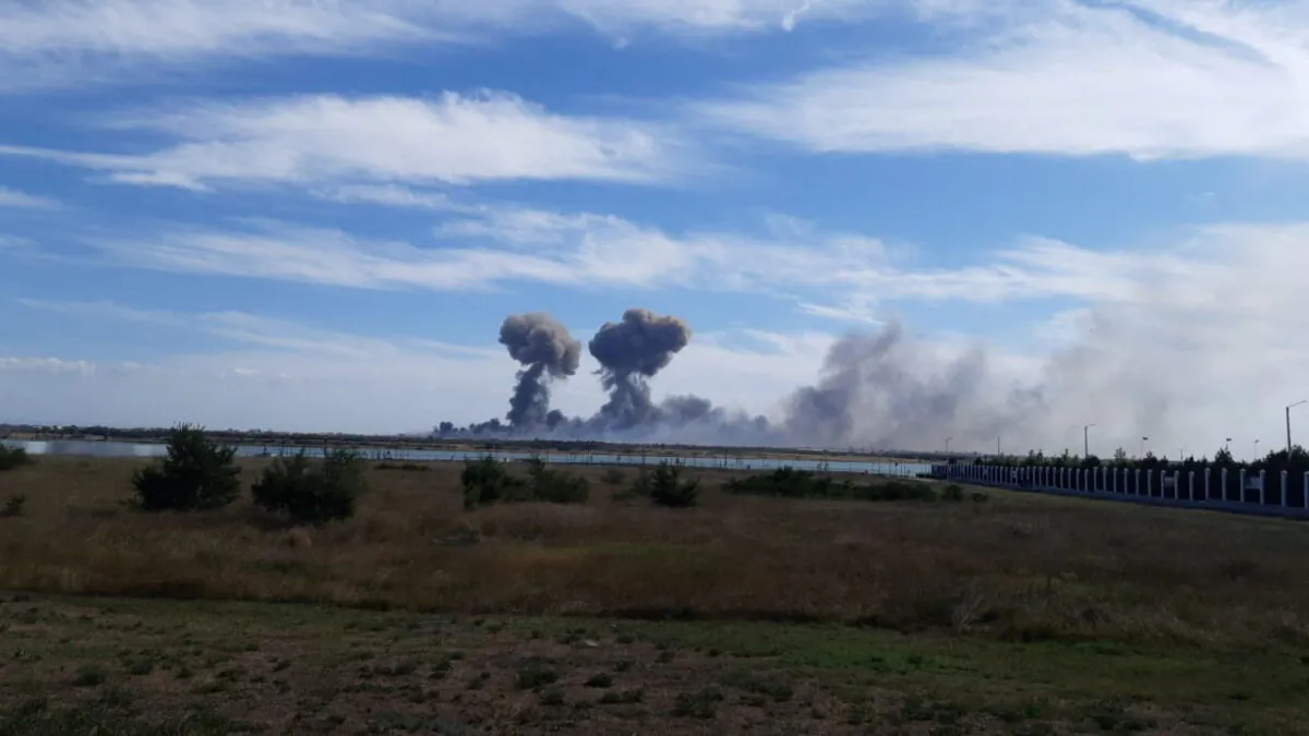 Smoke rises after explosions were heard from the direction of a Russian military airbase near Novofedorivka, Crimea, in this still image obtained by Reuters on Aug. 9, 2022. (Reuters)
