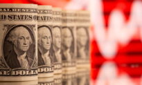 Dollar Edges Down Ahead of Key US Inflation Data