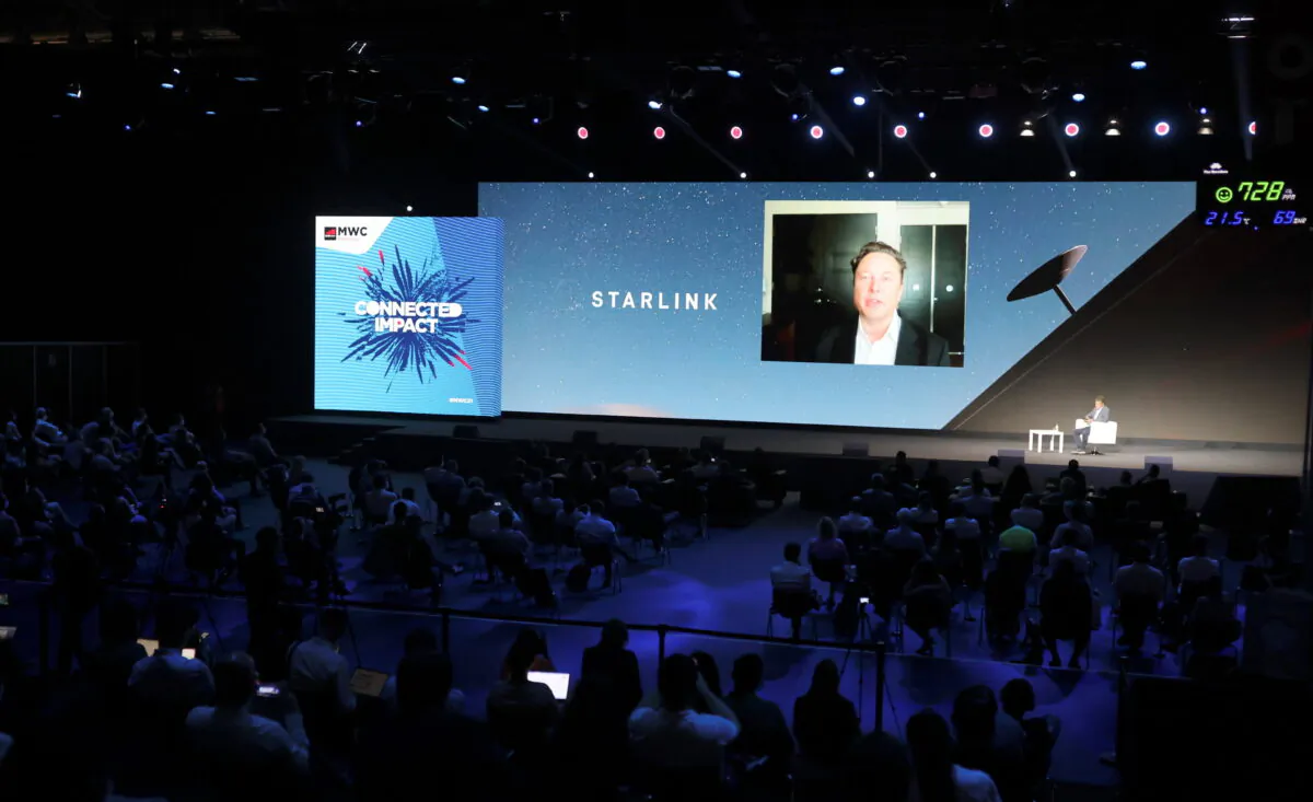 SpaceX founder and Tesla CEO Elon Musk speaks on a screen during the Mobile World Congress (MWC) in Barcelona, Spain, on June 29, 2021. (Nacho Doce/Reuters)
