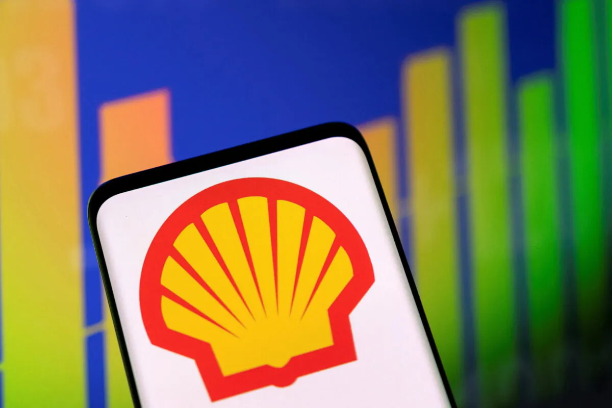 The Shell logo and a stock graph are seen in this illustration taken on May 1, 2022. (Dado Ruvic/Reuters)