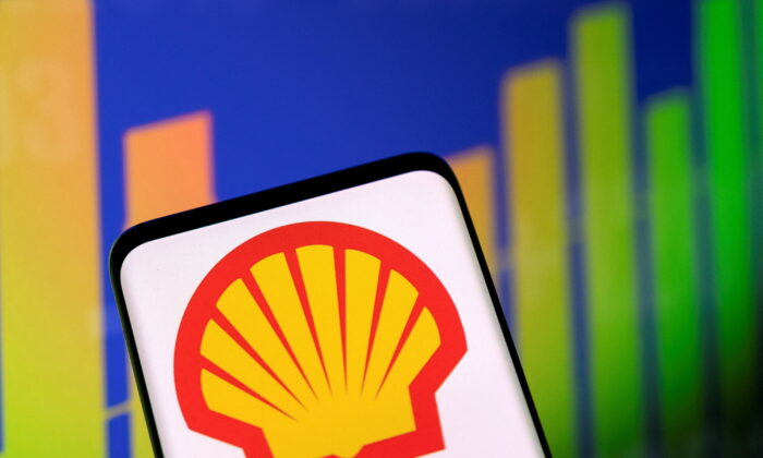 The Shell logo and a stock graph are seen in this illustration taken on May 1, 2022. (Dado Ruvic/Reuters)