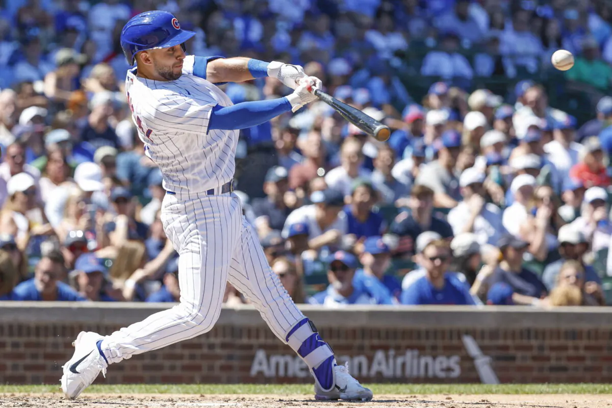 Chicago Cubs second baseman Nick Madrigal (1) doubles against the Washington Nationals during the third inning at Wrigley Field in Chicago, Aug 10, 2022. (Kamil Krzaczynski/USA TODAY Sports via Field Level Media)