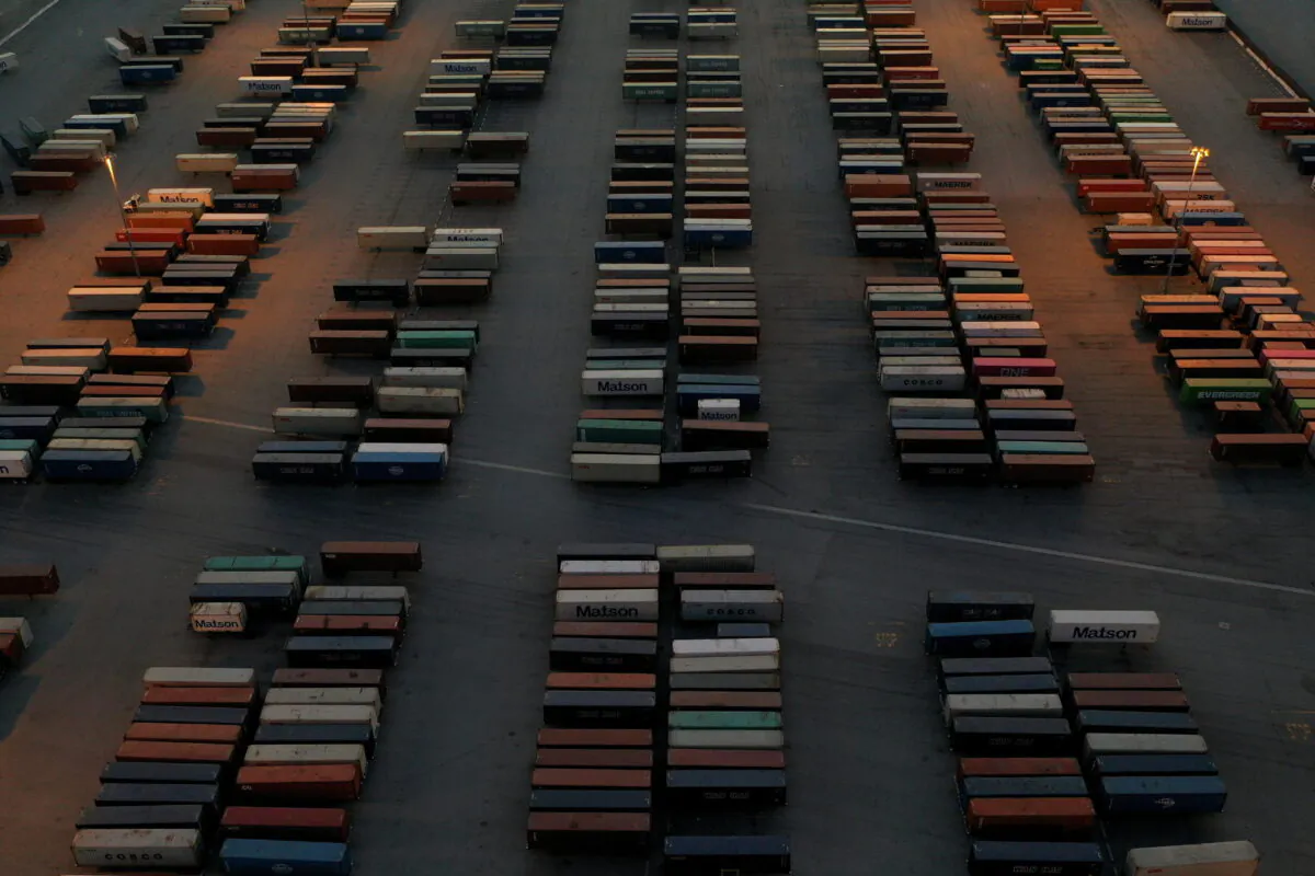 Cargo shipping containers are seen at a storage yard in Carson, Calif., on March 11, 2022. Picture taken with a drone. (Bing Guan/Reuters)