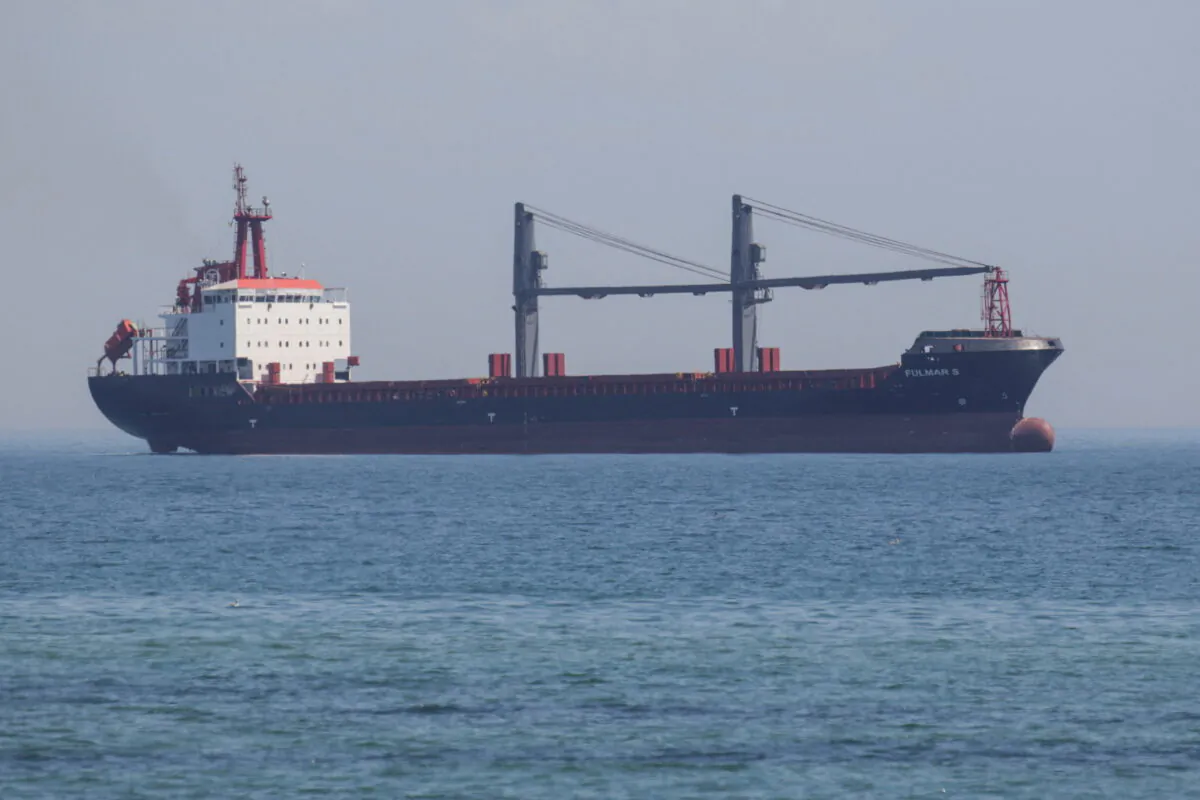 The Barbados-flagged general cargo ship Fulmar S arrives to the sea port in Chornomorsk after restarting grain export, Ukraine, on Aug. 7, 2022. (Serhii Smolientsev/Reuters)