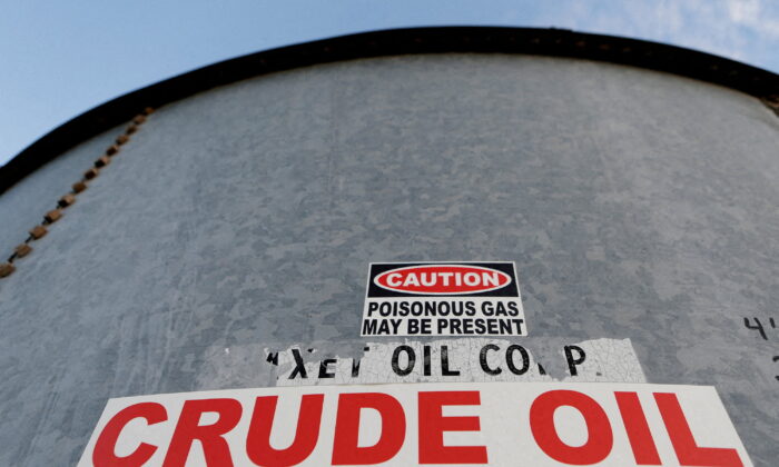 Sticker reads "crude oil" on the side of a storage tank in the Permian Basin in Mentone, Loving County, Texas, on Nov. 22, 2019.  (Reuters/Angus Mordant)