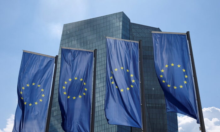 European flags are seen in front of the European Central Bank (ECB) building, in Frankfurt, Germany, on July 21, 2022. (Wolfgang Rattay/Reuters)