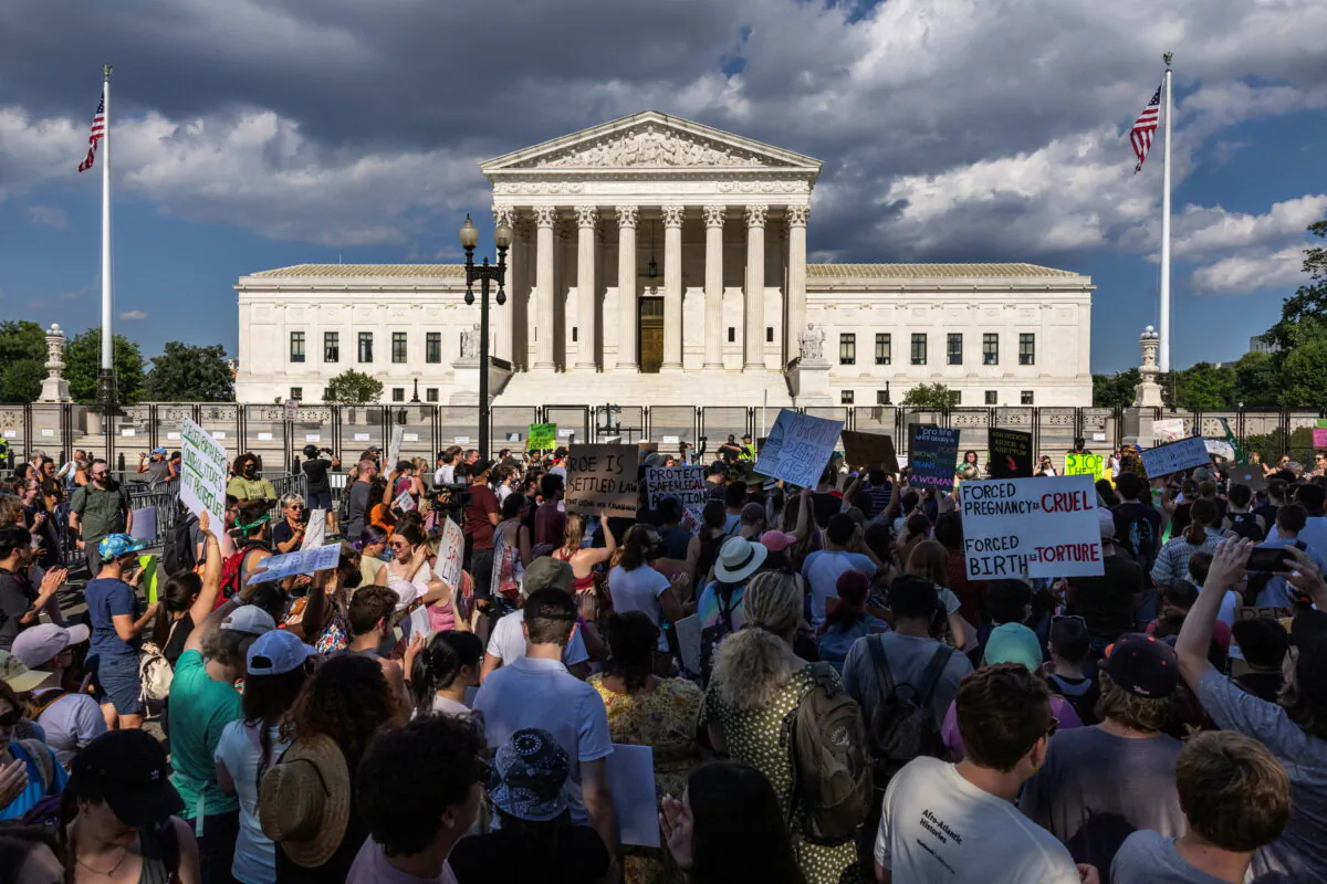 Pro-abortion protesters demonstrate outside the Supreme Court in Washington on June 25, 2022. (Evelyn Hockstein/Reuters)