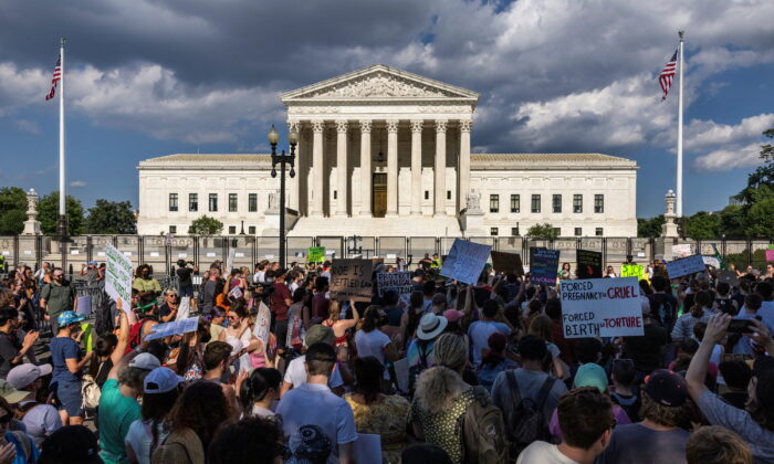 Pro-abortion protesters demonstrate outside the Supreme Court in Washington on June 25, 2022. (Evelyn Hockstein/Reuters)