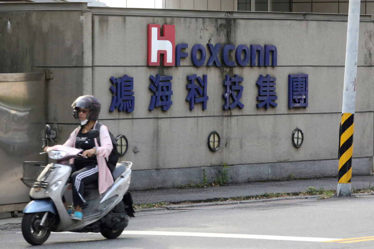 A motorist passes by a Foxconn office building in Taipei, Taiwan, on July 14, 2020. (Ann Wang/Reuters)