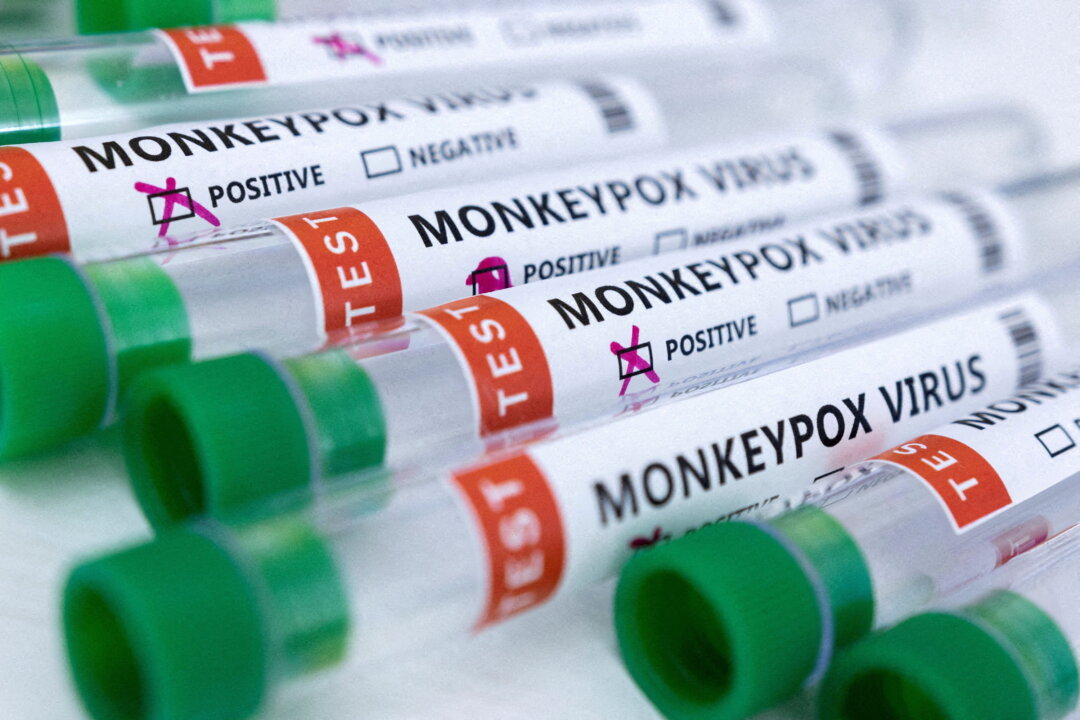 Test tubes labeled "Monkeypox virus positive and negative" are seen in this illustration taken on May 23, 2022. (Dado Ruvic/Illustration/Reuters)