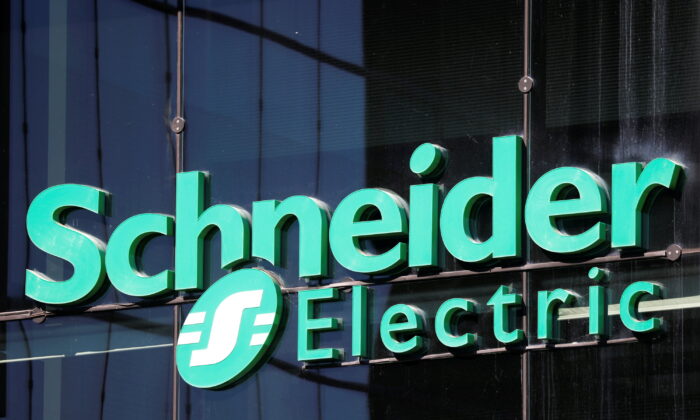 The logo of Scheider Electrics at the company's headquarters in Rueil-Malmaison near Paris on April 22, 2020. (Charles Platiau/Reuters)