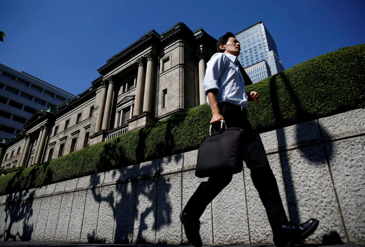 A man runs past the Bank of Japan (BOJ) building in Tokyo on July 29, 2016. (Kim Kyung-Hoon/Reuters)