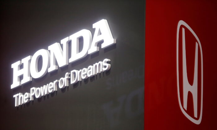The Honda logo is displayed at the 89th Geneva International Motor Show in Geneva on March 5, 2019. (Pierre Albouy/Reuters)