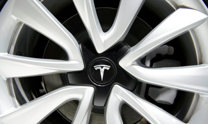 A Tesla logo on a wheel rim during the media day for the Shanghai auto show in Shanghai on April 16, 2019. (Aly Song/Reuters)