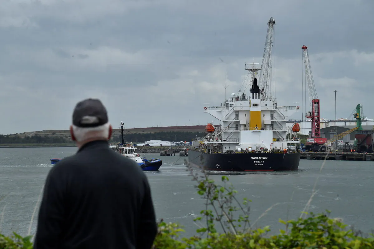 The Panama-flagged bulk carrier ship, the Navi Star, arrives at Foynes Port delivering 33,000 tons of Ukrainian corn to Ireland after departing Odessa following the formation of the Black Sea Grain Initiative, in Foynes, Ireland, on Aug. 20, 2022. (Clodagh Kilcoyne/Reuters)