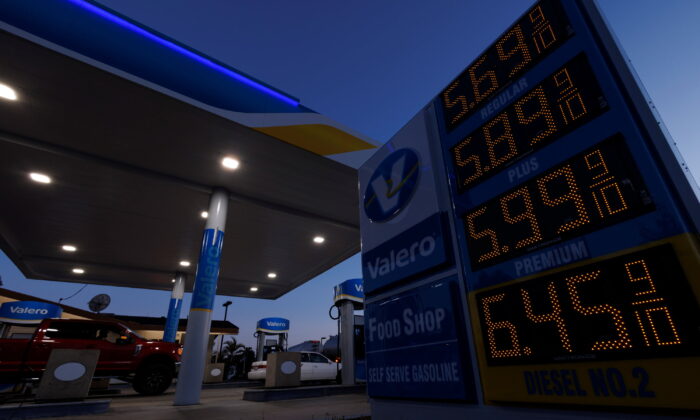 Gasoline prices are displayed as fuel cost continues to climb close to record setting territory in Encinitas, Calif., on May 9, 2022. (Mike Blake/Reuters)