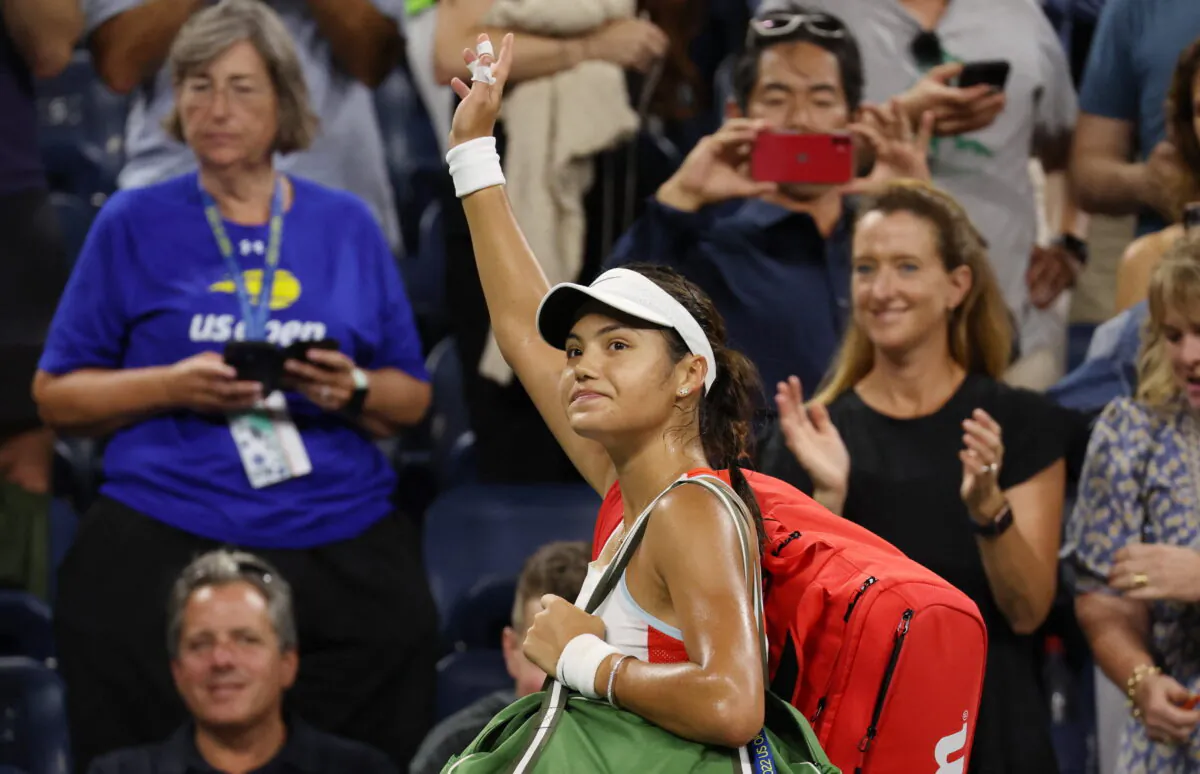 Britain's Emma Raducanu acknowledges the crowd after losing her first round match against France's Alize Cornet during the U.S. Open Tennis Tournament in Flushing Meadows, New York, on Aug. 30, 2022. (Shannon Stapleton/Reuters)