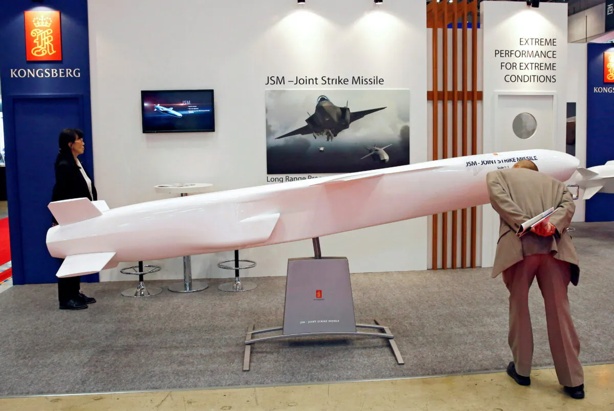 A visitor looks at Kongsberg's joint strike missile model during Japan Aerospace 2016 air show in Tokyo on Oct. 12, 2016. (Kim Kyung-Hoon/Reuters)