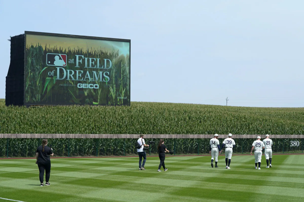 Major League Baseball returns to Iowa on Thursday, Aug. 11, 2022, when the Chicago Cubs play the Cincinnati Reds in the second “Field of Dreams” game at a throwback ballpark near where the 1989 movie was filmed. Chicago White Sox players walk on the field before a baseball game against the New York Yankees in Dyersville, Iowa, Thursday, Aug. 12, 2021. (Charlie Neibergall/AP Photo)