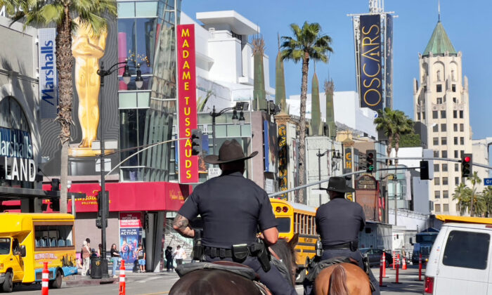 Los Angeles Police Officers are seen patrolling on Hollywood Boulevard on horses as the city gets ready for the 94th Academy Awards in Hollywood, Calif. on March 23, 2022. (Daniel Slim/AFP via Getty Images)