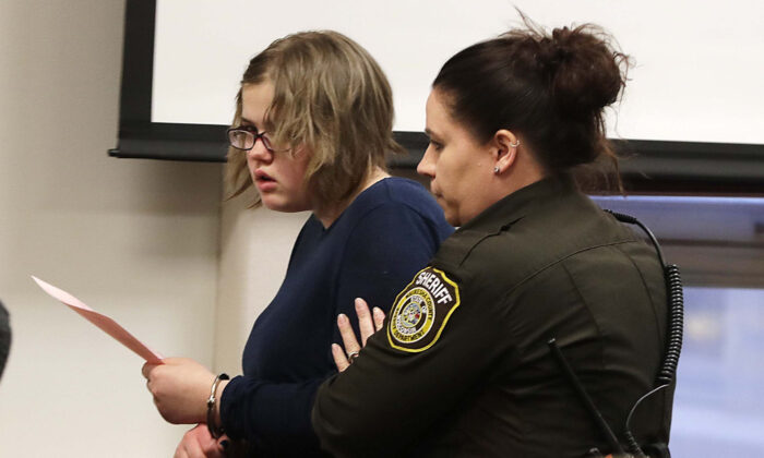 Morgan Geyser is escorted out of the courtroom following her sentencing in Waukesha, Wis., on Feb. 1, 2018. (Rick Wood/Milwaukee Journal-Sentinel via AP, Pool)