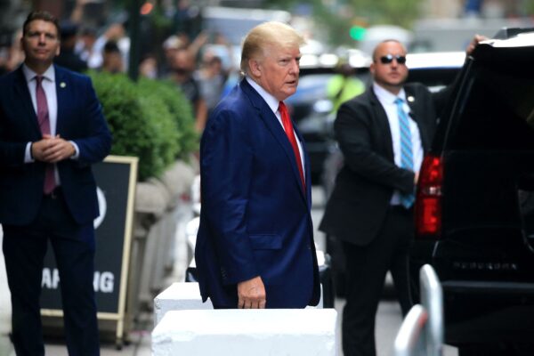 Trump walks to a vehicle