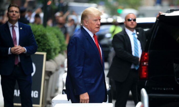 Former President Donald Trump walks to a vehicle outside of Trump Tower in New York on Aug. 10, 2022. (Stringer/AFP via Getty Images)