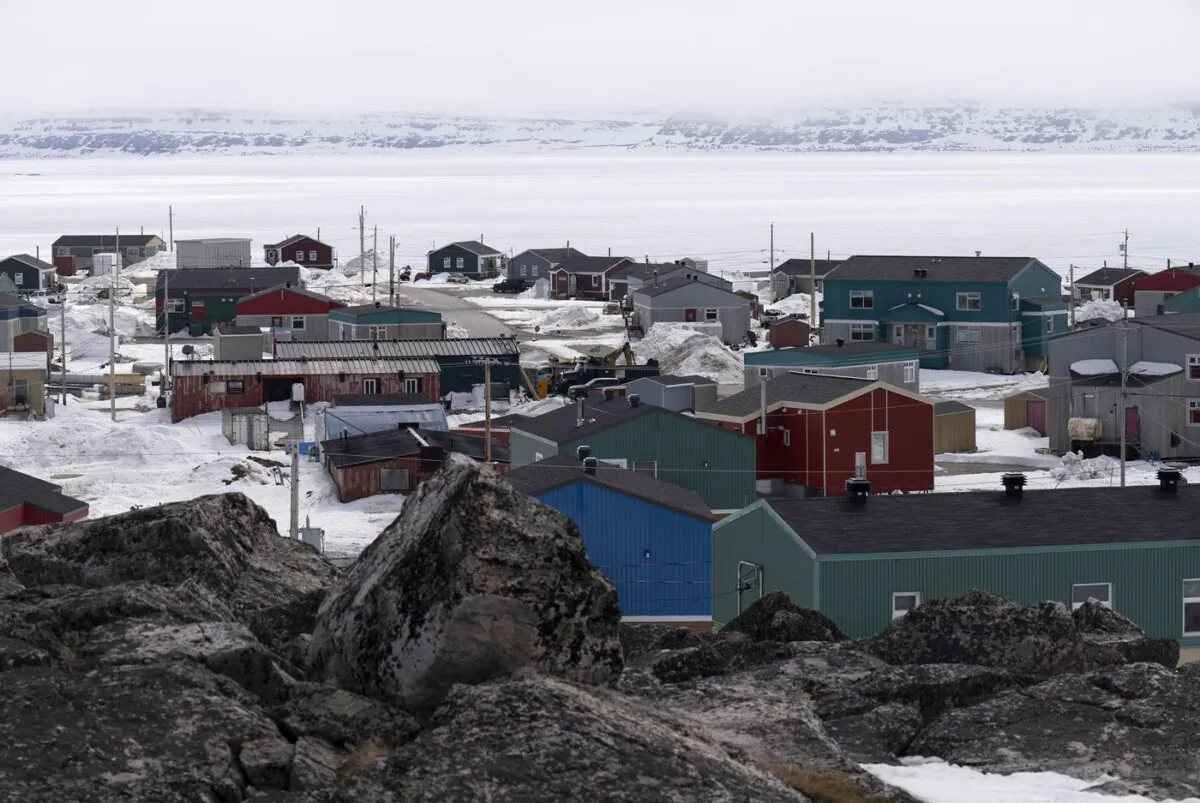 The village of Inukjuak is seen on the shore of Hudson Bay May 12, 2022 in Inukjuak, Que. (The Canadian Press/Adrian Wyld)