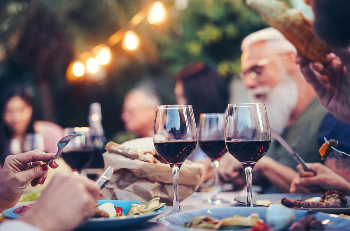 The selection of wine for outdoor dining must take into account factors that don't play a role when inside a dining room, like smoke and floral fragrances. (AlessandroBiascioli/Shutterstock)