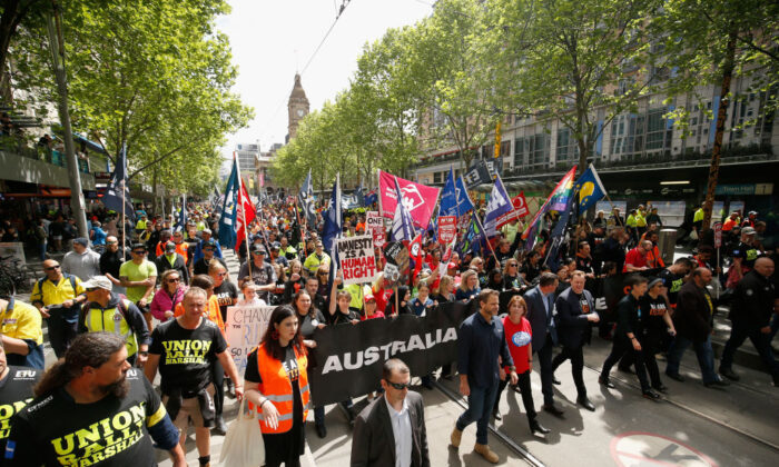 Protesters take part in a rally organised by the ACTU in Melbourne on Oct. 23, 2018. (Darrian Traynor/Getty Images)