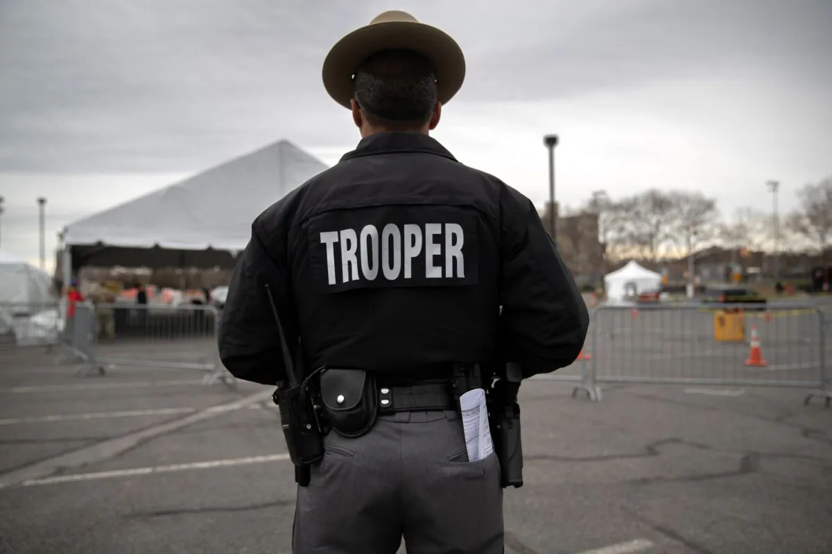 A New York State trooper stands in the Bronx, New York, on March 28, 2020. (John Moore/Getty Images)